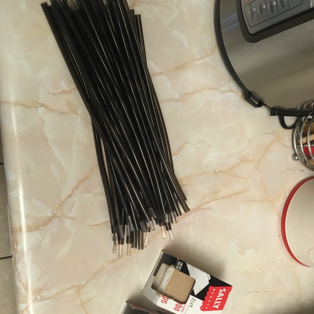 Flexible perm rods and paper wraps. Bought and never used